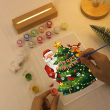 Laden Sie das Bild in den Galerie-Viewer, LED Präsentationssockel aus Holz Malen nach Zahlen 15x20 cm - Weihnachtsmann 03