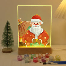 Laden Sie das Bild in den Galerie-Viewer, LED Präsentationssockel aus Holz Malen nach Zahlen 15x20 cm - Weihnachtsmann 09